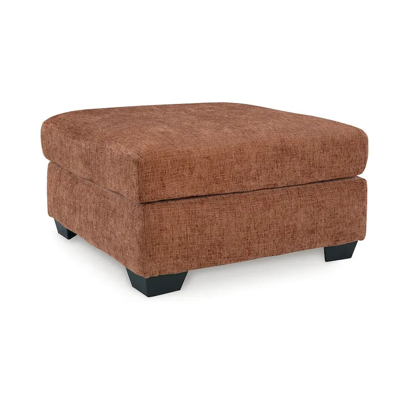 Pouf poggiapiedi di grandi dimensioni rivestito con piedini a vista in simil-legno
