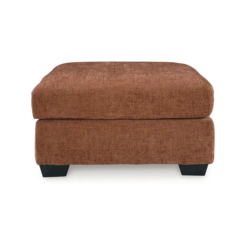 Pouf poggiapiedi di grandi dimensioni rivestito con piedini a vista in simil-legno
