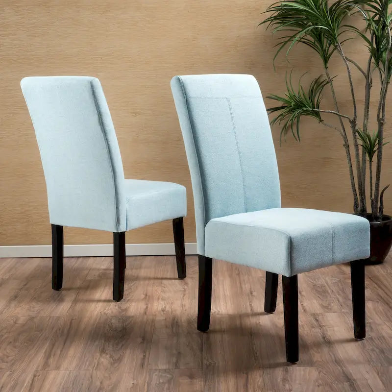 Sedia da pranzo contemporanea con tappezzeria a punto T e gambe in legno massello