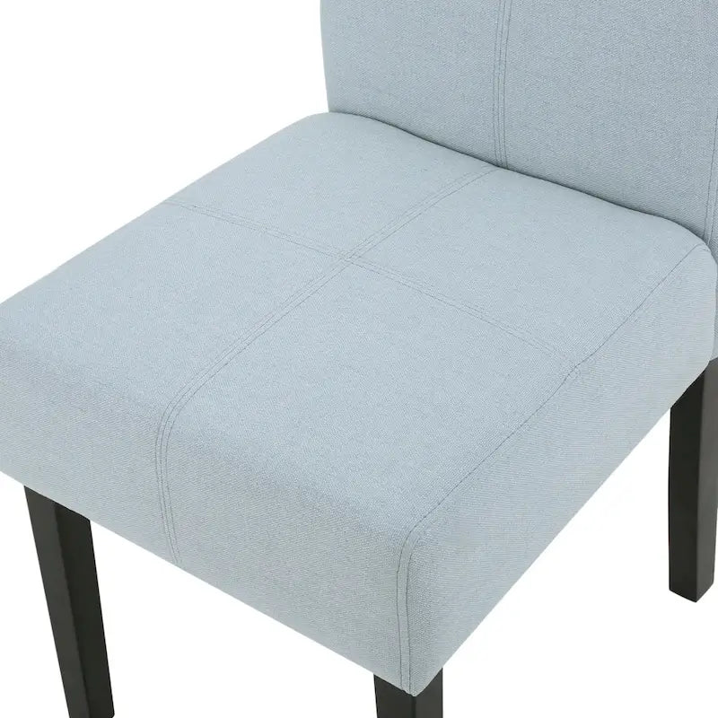 Sedia da pranzo contemporanea con tappezzeria a punto T e gambe in legno massello