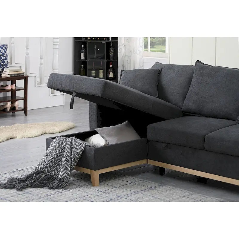 Divano letto sezionale reversibile in tessuto grigio scuro con chaise longue contenitore e letto estraibile