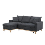 Divano letto sezionale reversibile in tessuto grigio scuro con chaise longue contenitore e letto estraibile